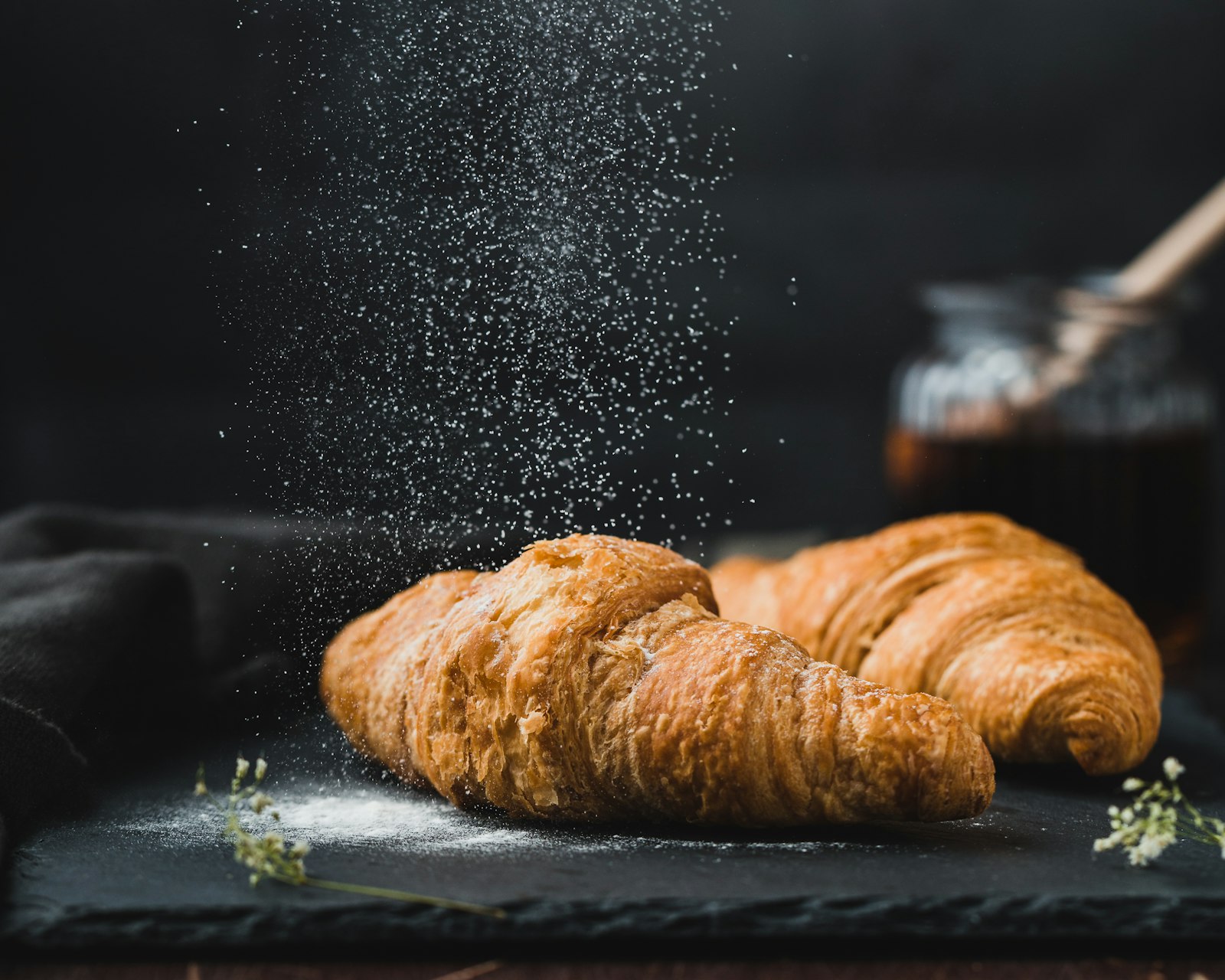 Freshly baked croissants dusted with sugar