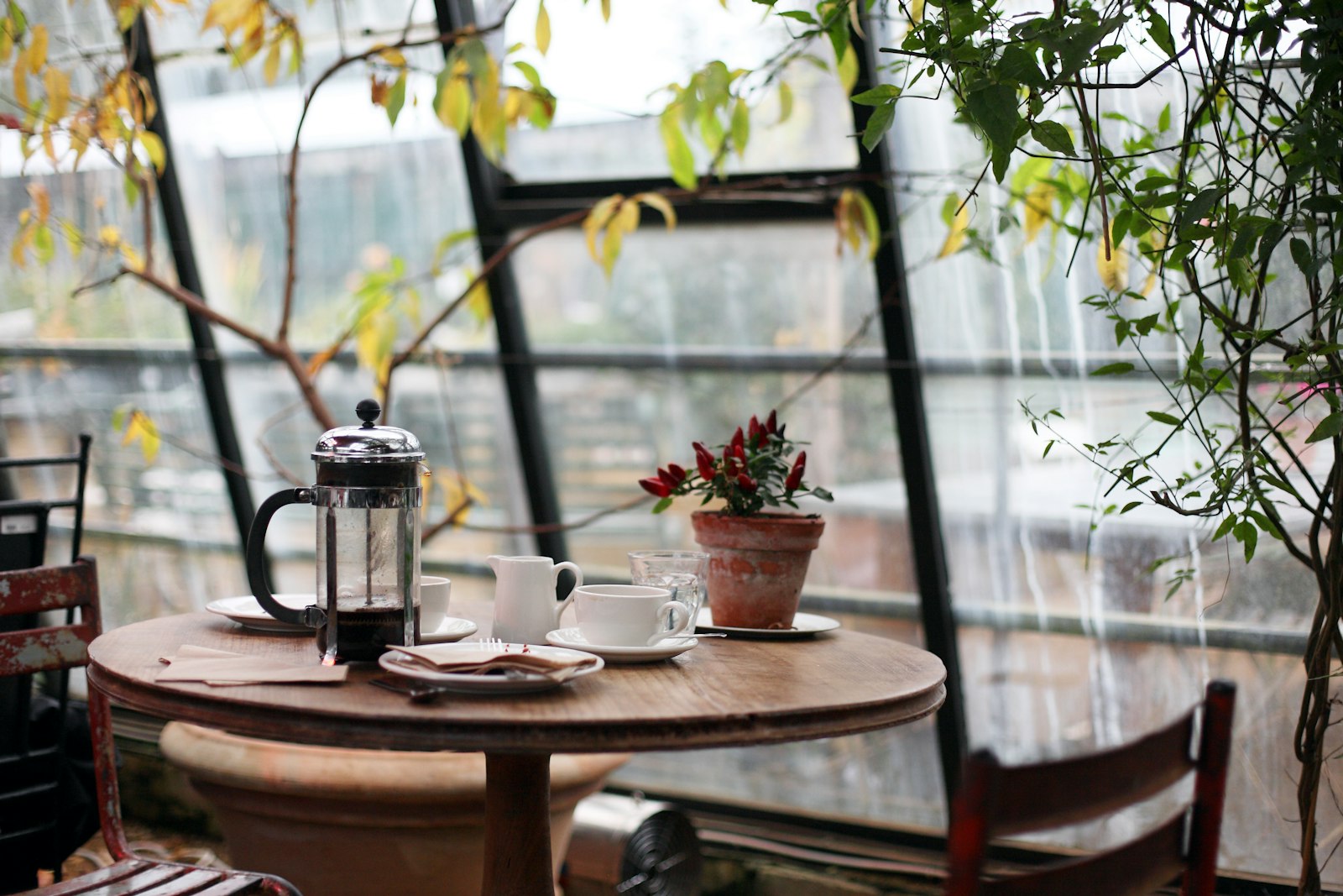 A quiet table set with coffee, ready for guests