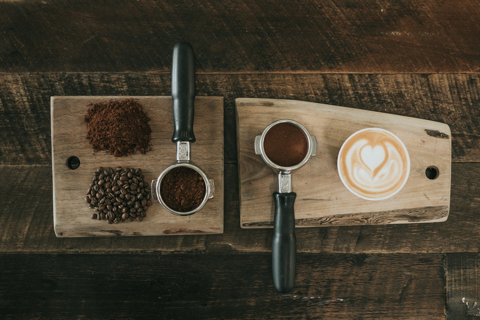 Espresso tools and latte on a wooden board